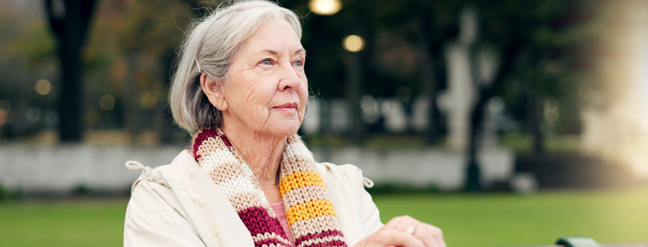 Relax, thinking and a senior woman at the park for summer