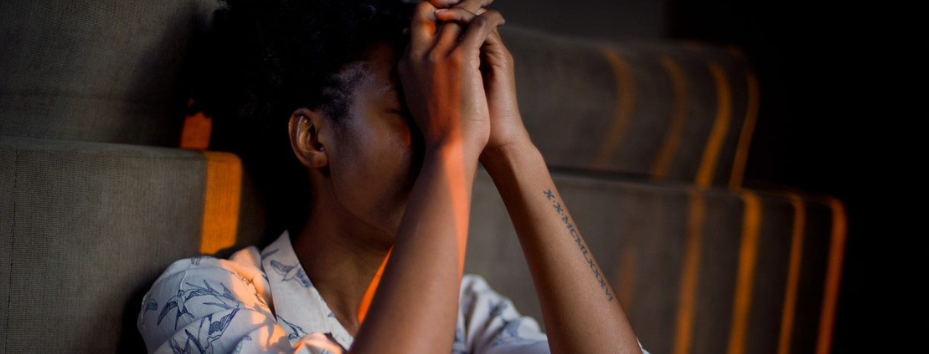 young black woman who looks upset